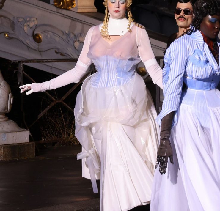 The actress took to the runway in a corseted, rubber-accented dress in Paris
