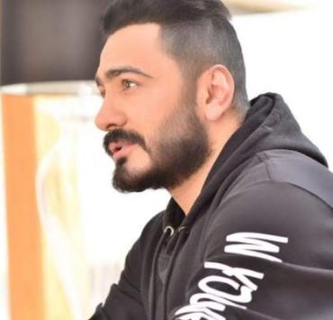 تامر حسني بفيديو من كواليس تصوير غلاف ألبومه الجديد