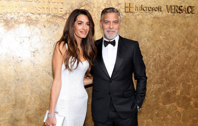 جورج كلوني وزوجته يتألقان في حفل "ألبي"