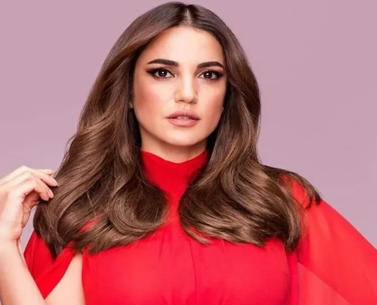 درة التونسية تحسم جدل حملها-صورة